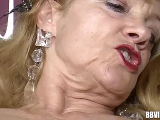 Sultry German MILFs share a throbbing cock in this steamy threesome, their eyes locked in a silent challenge! Watch them compete for dominance, their bodies glistening with sweat as they reach their peak.