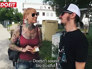 Kinky tattooed German MILF joins a hardcore Berlin van adventure, the rough fabric against her skin adding a gritty texture that heightens the rush
