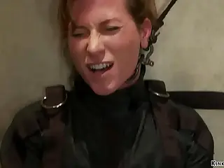 Chained MILF enjoys a thrilling dildo session, the cold metal links contrasting with the warm buzz against her skin