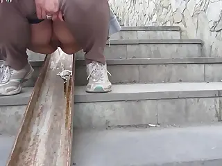 That daring MILF seeks thrills in public urination, her bold steps on outdoor stairs drawing out an amateur fetish vibe under the open sky. The cool breeze against wet surfaces adds a tantalizing chill, mixing exposure with raw excitement in a heartbeat. Moments of vulnerability explode into liberating rushes, turning everyday scenes into pulses of forbidden adventure.